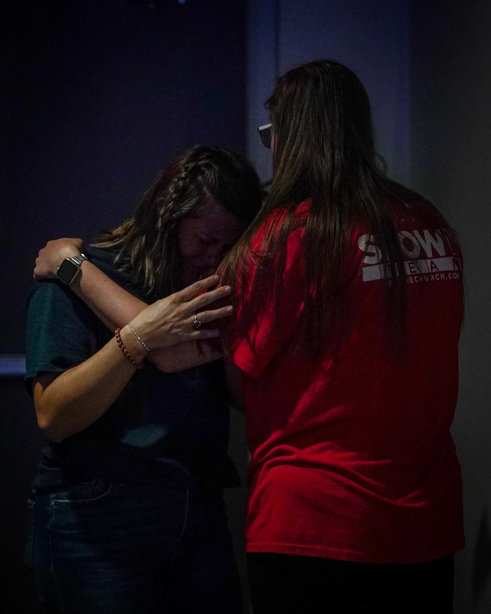 People praying together after a service