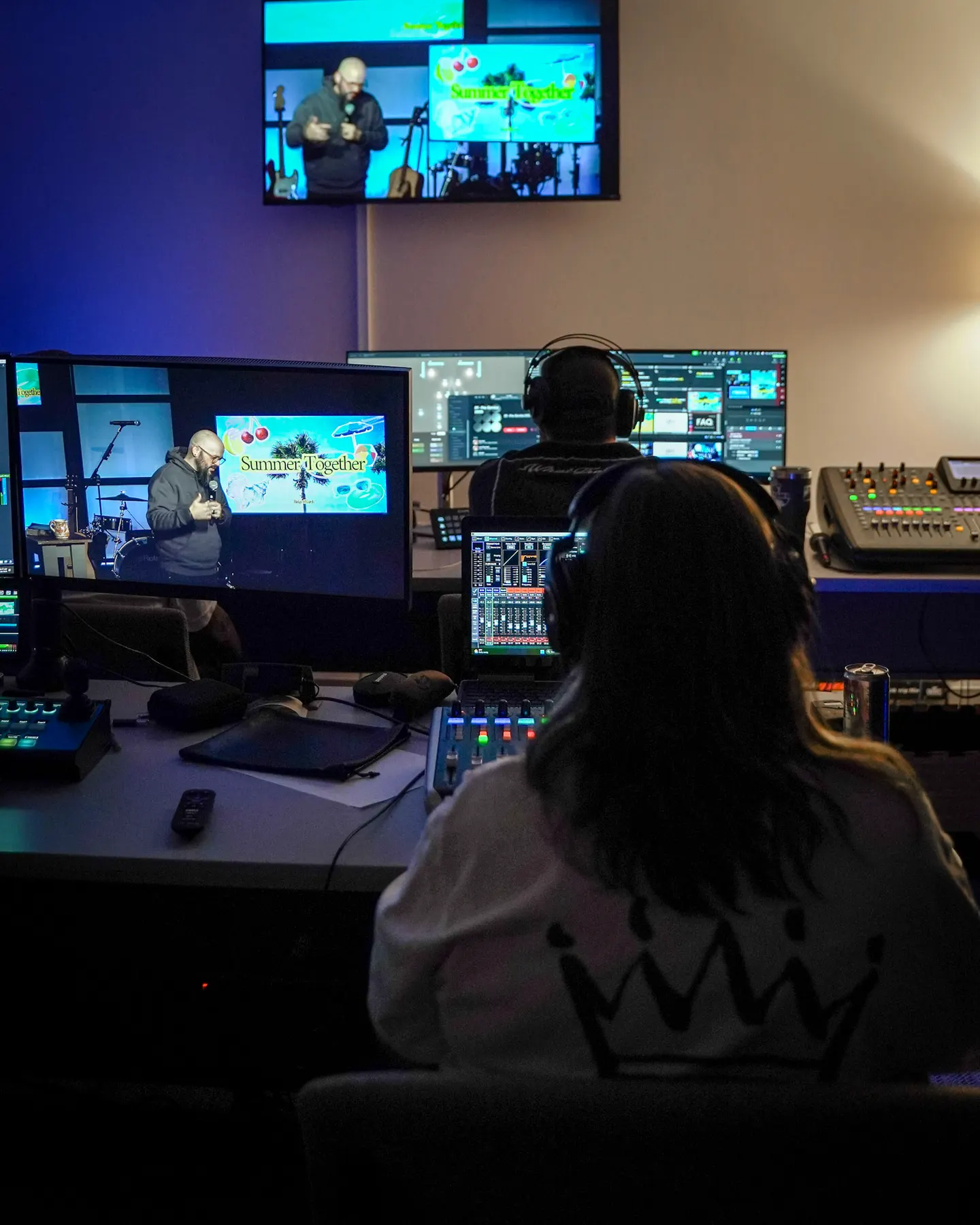The production team at the desk during a service